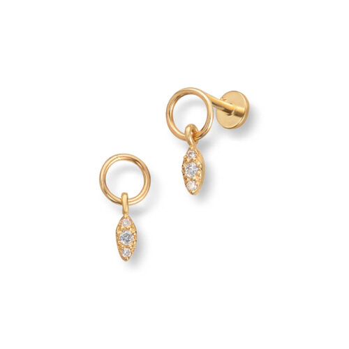 Piercing i gull med diamanter